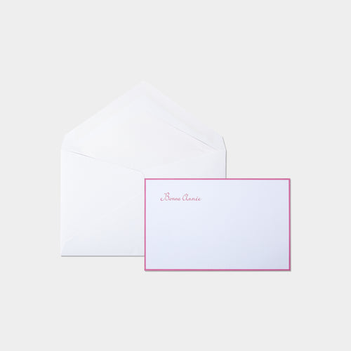 Carte festive motif bonne année rose et son enveloppe assortie blanche