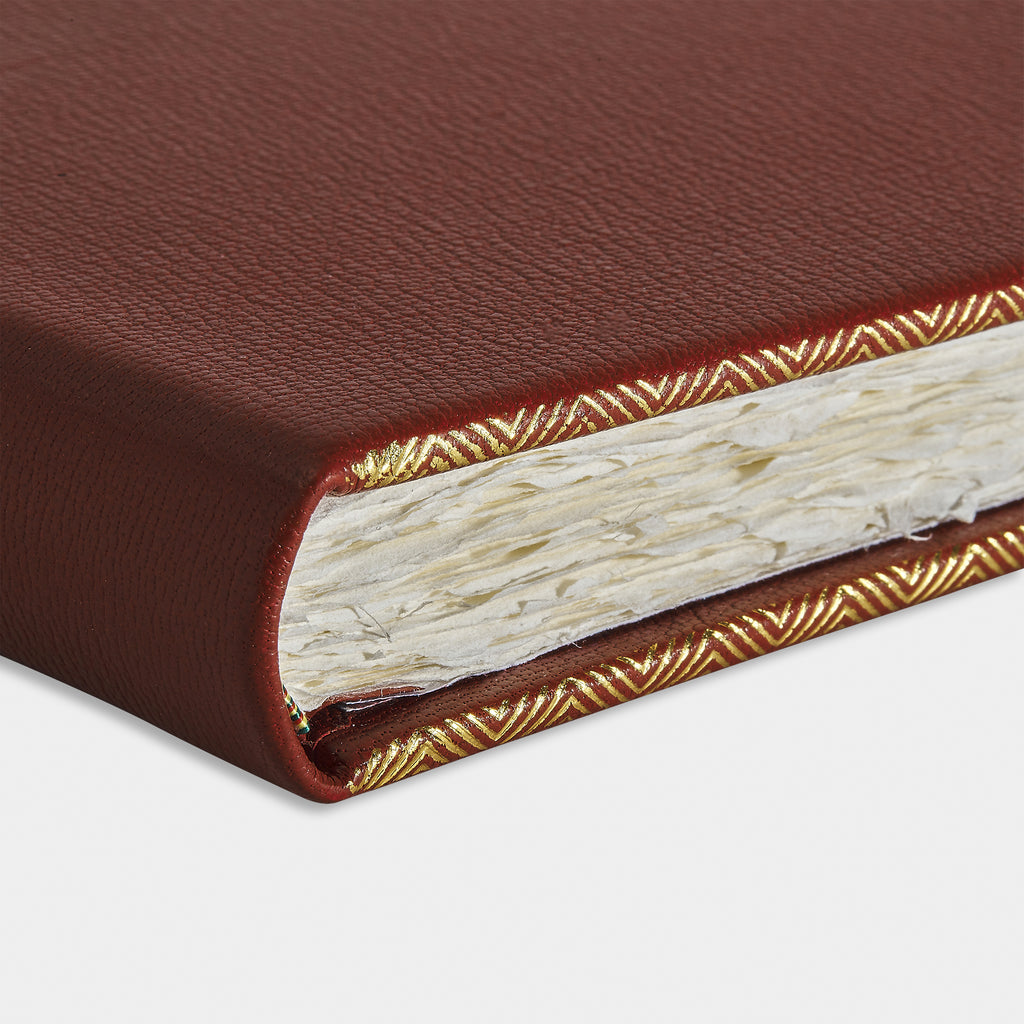 Zoom livre d'or cuir maroquin rouge Benneton Graveur fermé