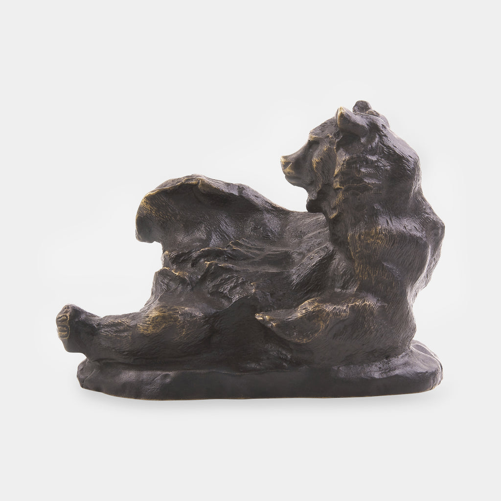 The bear lying on its back