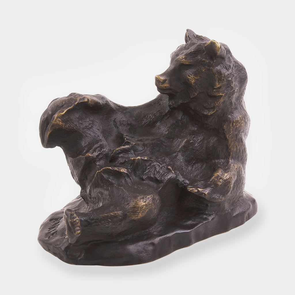 The bear lying on its back