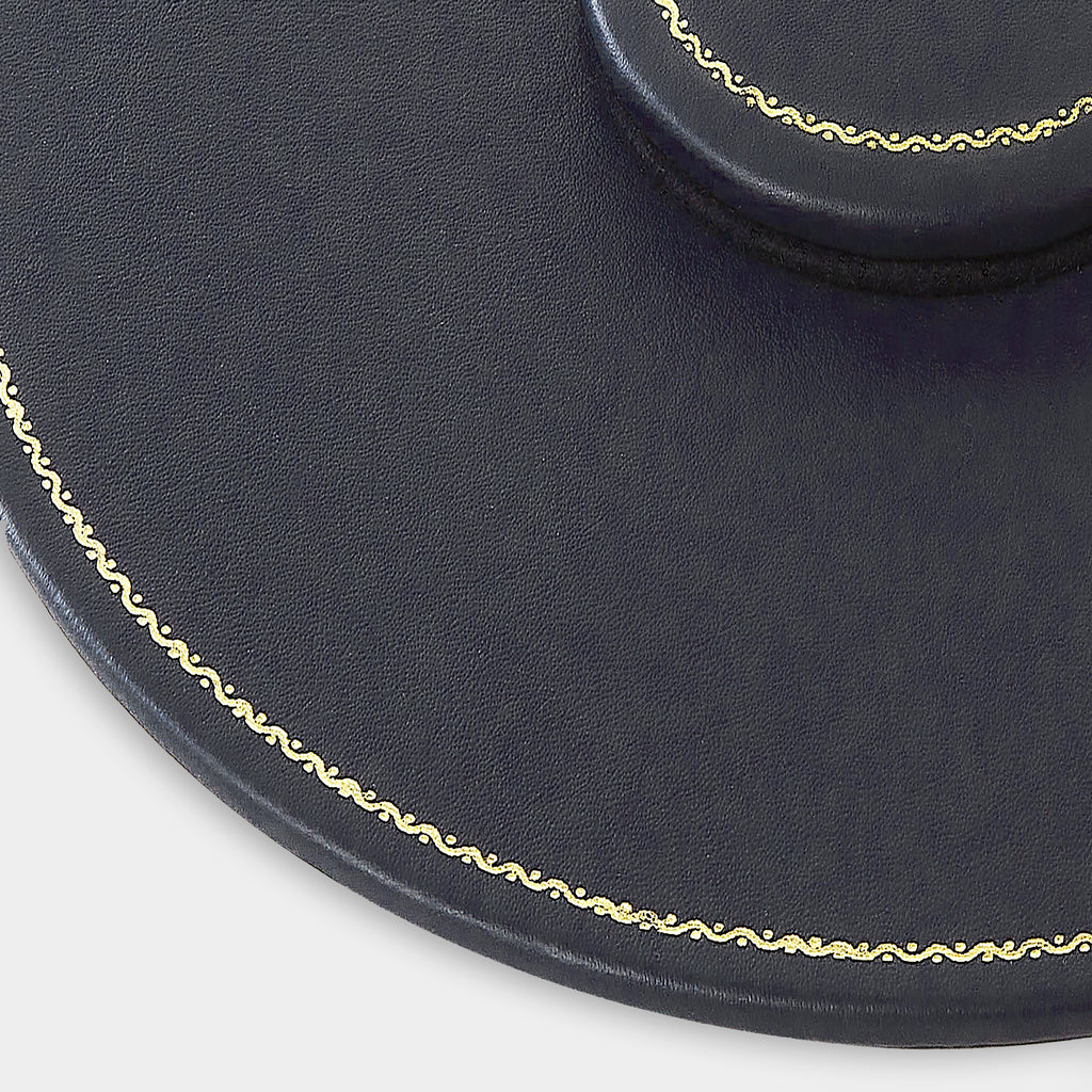 Zoom plan de table en cuir rond bleu marine Benneton Graveur