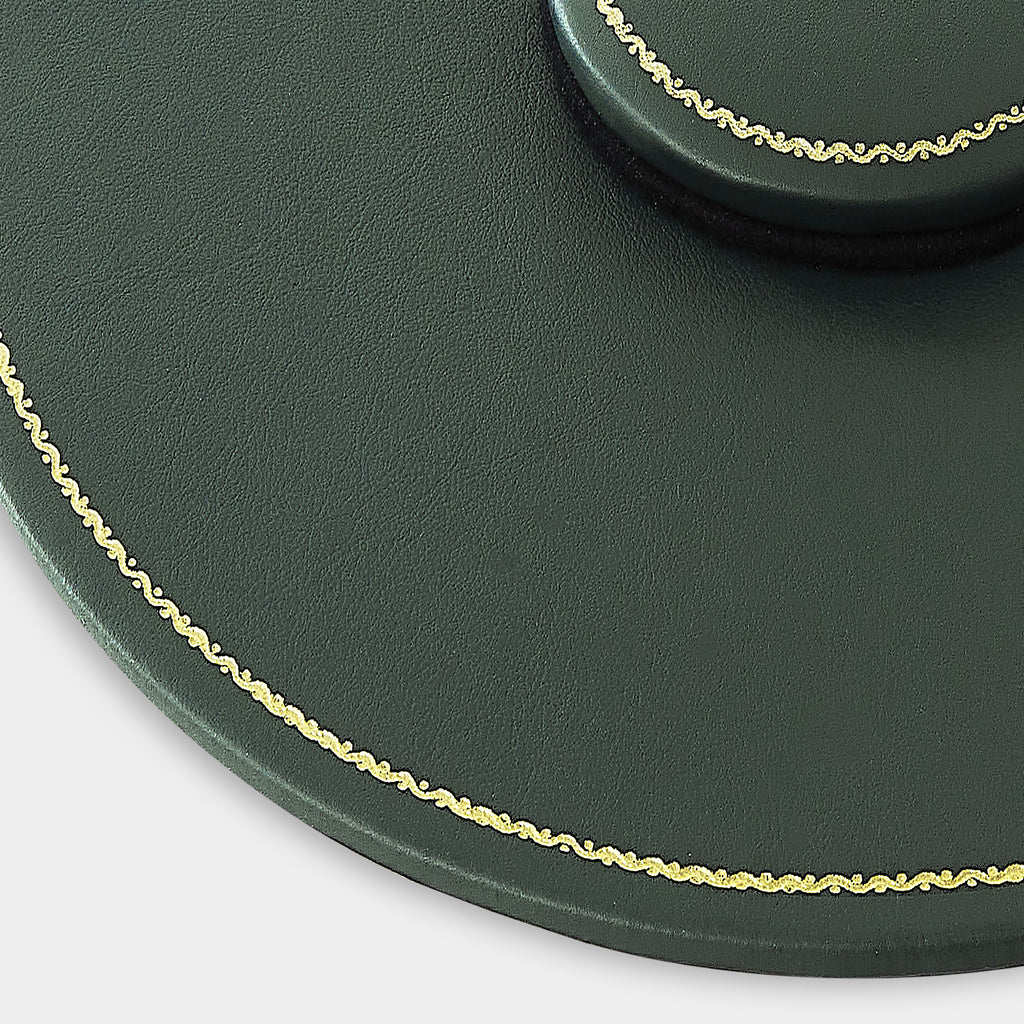 Zoom plan de table en cuir rond vert Benneton Graveur