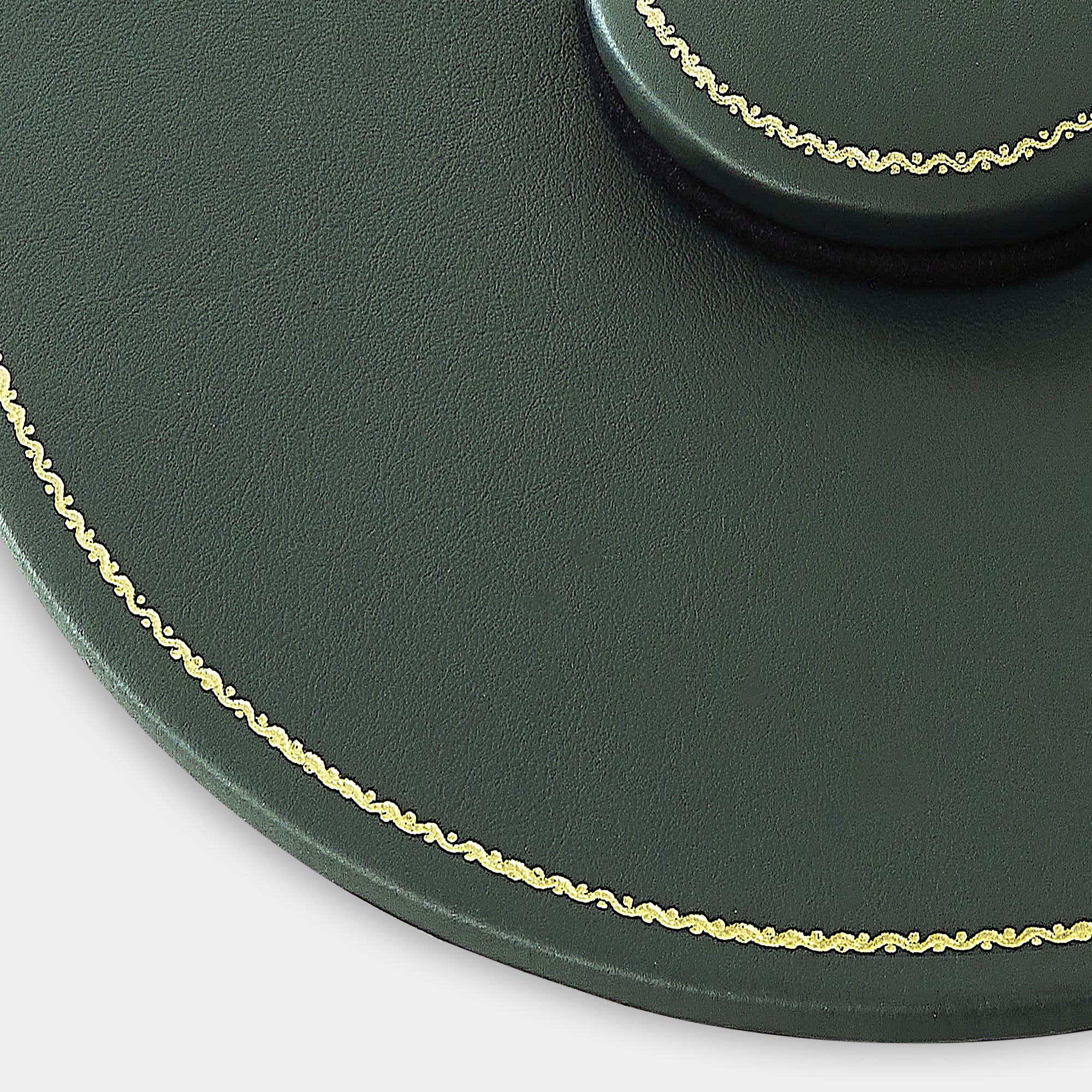 Zoom plan de table en cuir rond vert Benneton Graveur