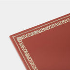 Zoom sous-main rectangulaire frise rouge Benneton Graveur